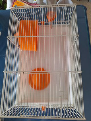 Jaula hamster naranja y blanca