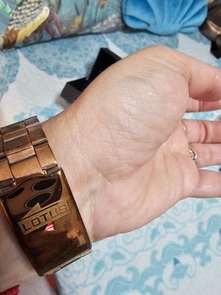 Reloj Lotus dorado rosa