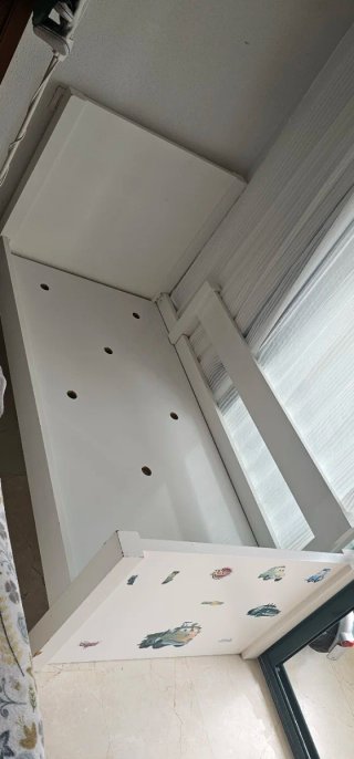 Cama infantil con colchón.