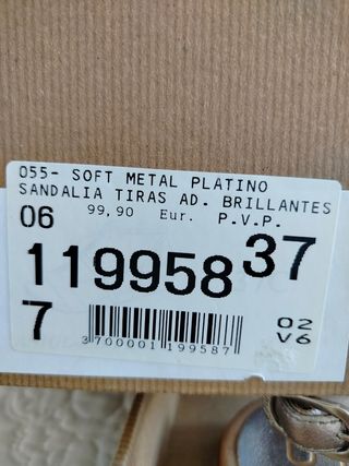 Sandalias Unisa platino y brillantes. Talla 37