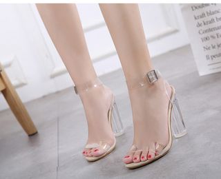Sandalias doradas tacón trasparente. N35 y 37