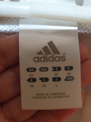 Chaqueta Adidas blanca y lila