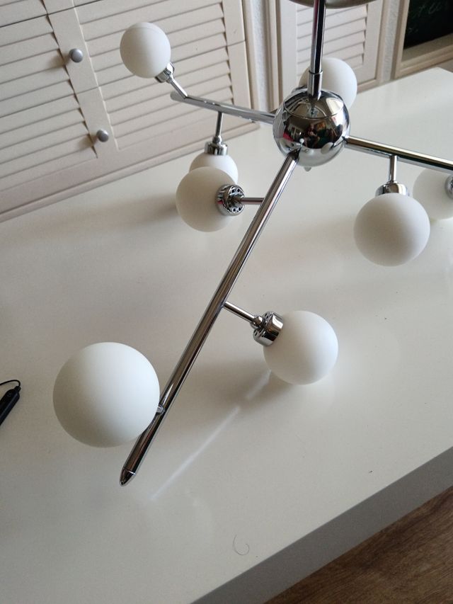 Lampara moderna nueve luces
Regulable en altura. 