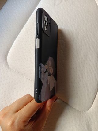 Funda Xiaomi Redmi Note 10 negra con adorno. Nueva