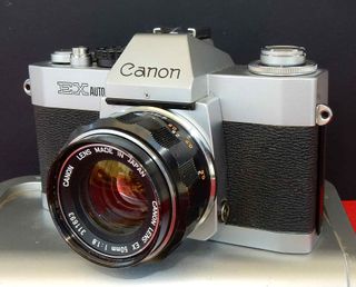 1584-Camara CANON EX AUTO -canon 1.8/50mm-funciona