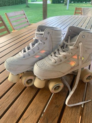 Pattini a rotelle bianchi, num. 37