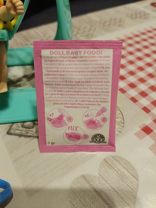 Muñeca Amiccichi columpio