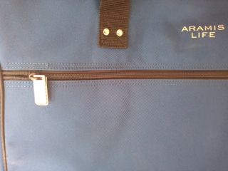 Maleta Aramis de lona azul