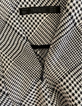 Shorts cuadros beige y negros
