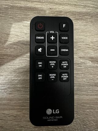 Barra sonido negra mas subwoofer y mando