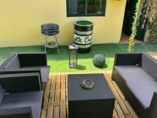Cabaña turística con jardín
