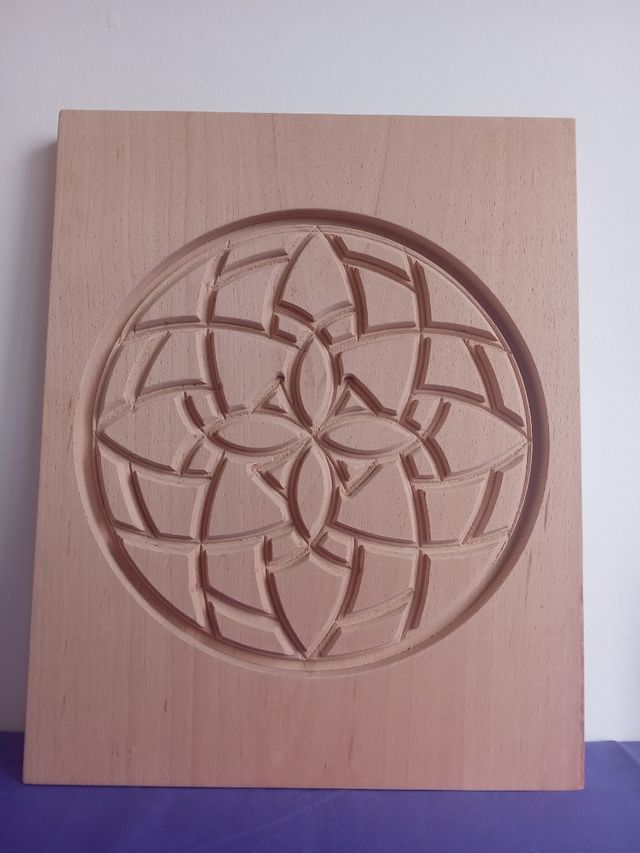 Mandala de madera dura tallada, Armonizador