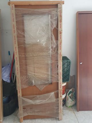 Puerta entrada madera nueva 30€ 2 10 x80