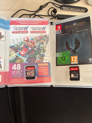 Nintendo Switch OLED blanca + juegos y maletin