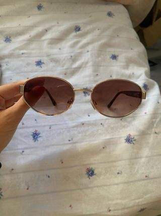 Gafas sol redondas doradas