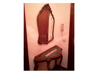 Recibidor antiguo con espejo