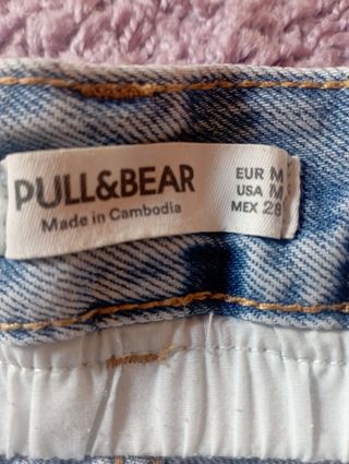 Mini falda vaquera desgastada