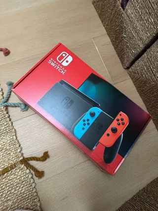 Nintendo Switch + Tarjeta micro SD 128 GB. 