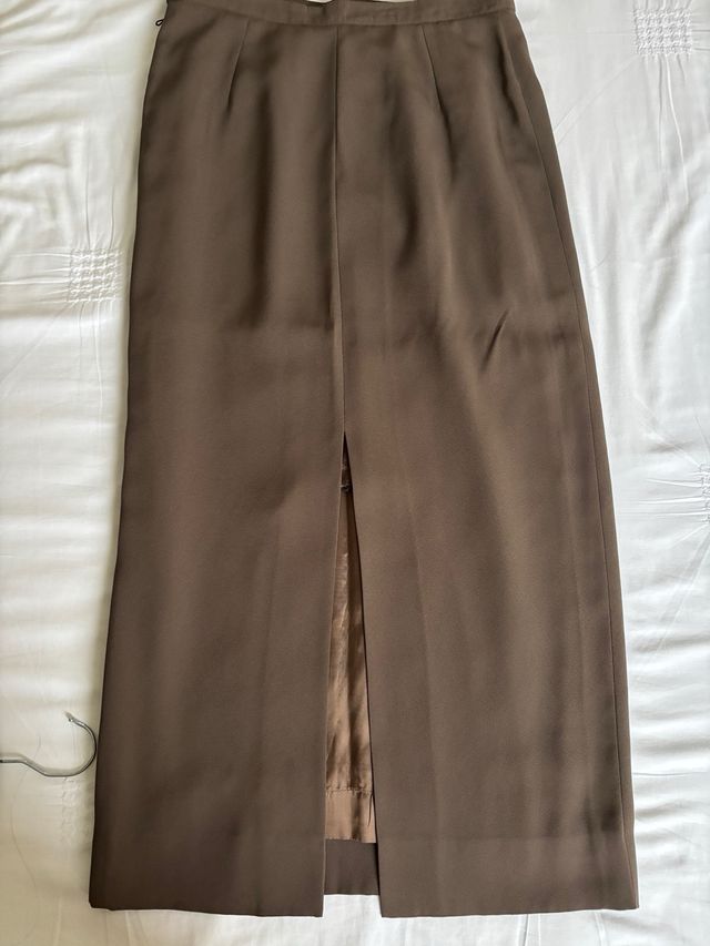 Traje chaqueta top y faldas