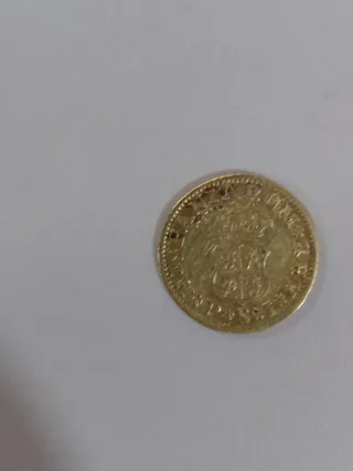 1/2 Escudo de Fernando VI oro.