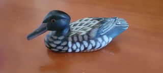 Patos madera tallados
