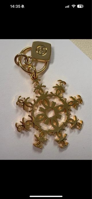 Charm Chanel fiocco di neve colore oro