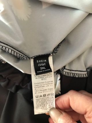 Pantaloni a zampa bianchi e neri