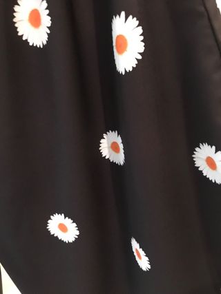 Pantaloni a zampa bianchi e neri