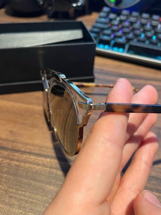 Gafas Dior doradas y marrones