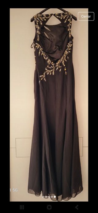 Vestido negro con pedreria dorado