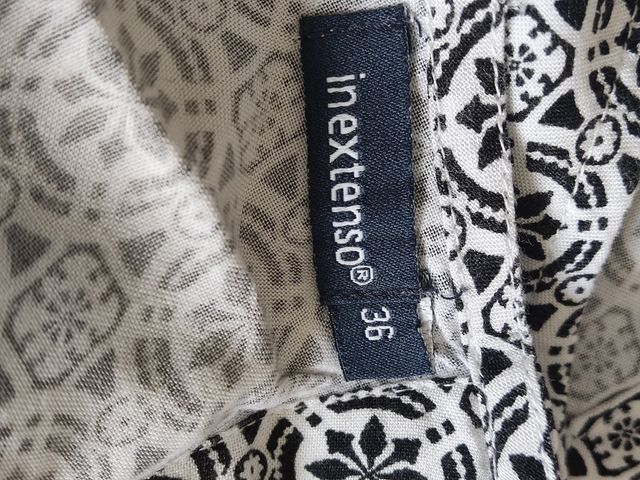 Blusa negra y blanca talla S