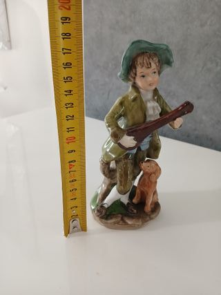 Statuetta Bambino con Cane che Suoba Ceramica Capo