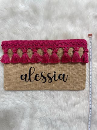 Pochette in juta con frange e nome colorato
