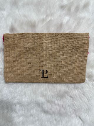 Pochette in juta con frange e nome colorato