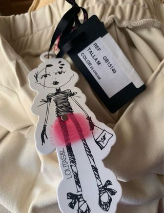 Falda plisada beige y morada