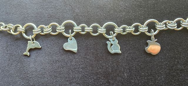 Braccialetto acciaio ciondoli