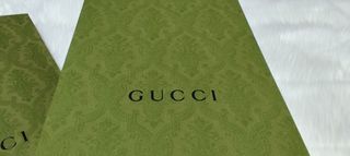 Caja y bolsa Gucci 