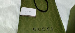 Caja y bolsa Gucci 