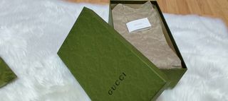 Caja y bolsa Gucci 