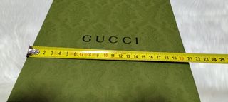 Caja y bolsa Gucci 