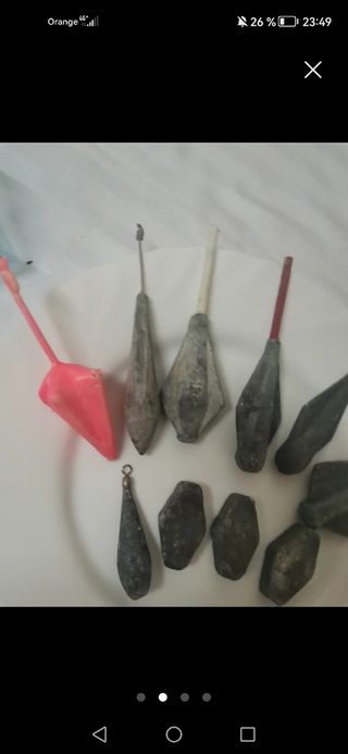 Señuelos de pesca Rapala,  anzuelos y plomos. 