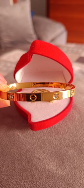 Pulsera Cartier + anillo dorado