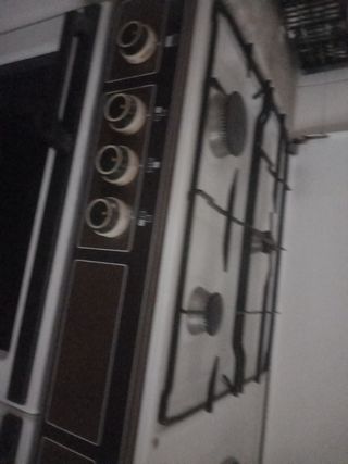 Cocina 4 fuegos y horno 120