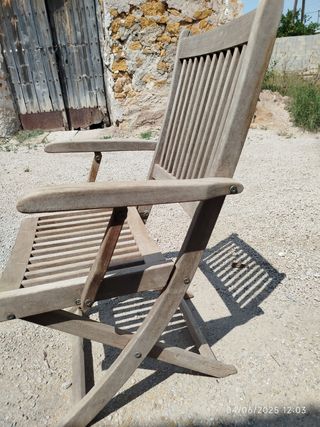 Silla plegable de madera antigua