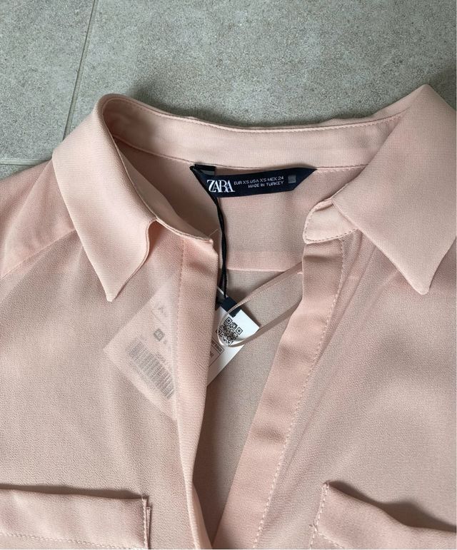 Blusa de Zara rosa semitransparente. Talla XS