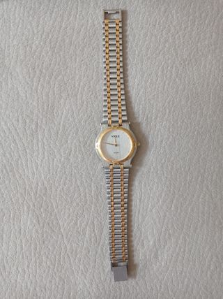 Reloj Vogue dorado y plateado
