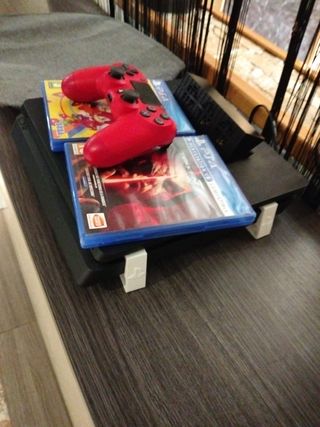 PS4 (PlayStation 4) con 2 juegos
