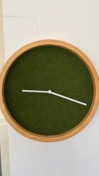 Orologio da parete ovale in legno cm 30