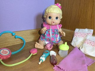 Muñeca Baby Alive + accesorios