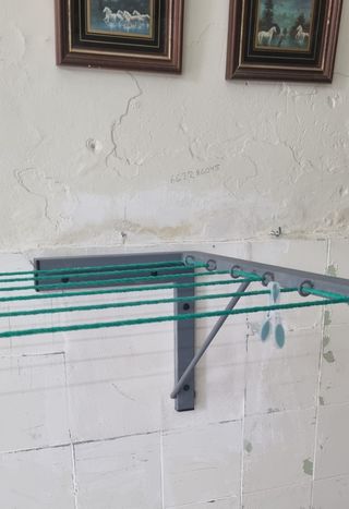 Tendedero metálico plegable a pedido.